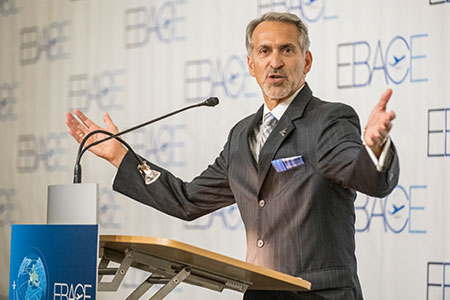 Michael Amalfitano, President and CEO of Embraer, addresses members of the media before EBACE opens at the Media Lunch.
