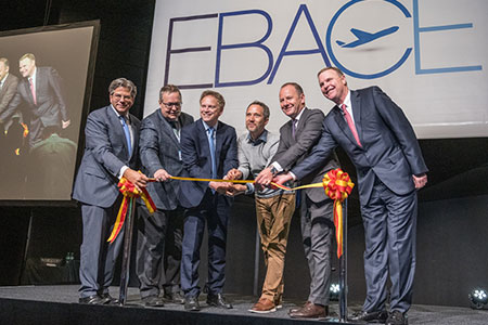 Athar Khan, André Schneider, Rt Hon Grant Shapps, Florian Reuter, Serge Dal Busco and Ed Bolen cut the ribbon and officially open EBACE2019