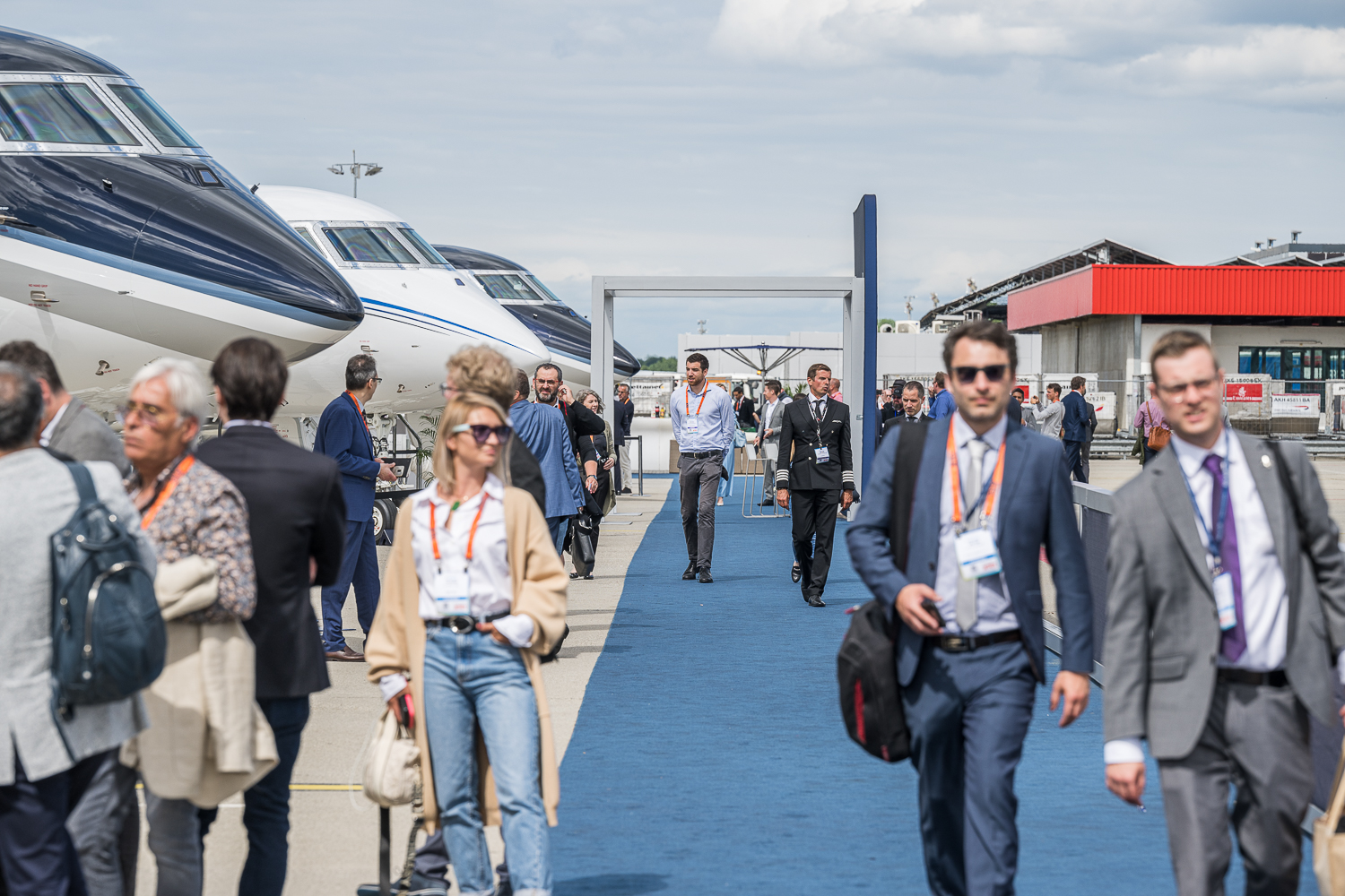 Attendees network and tour the Display of Aircraft at the Geneva Airport on Tuesday during EBACE2022
